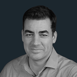 John Jamie - Bio Pic with Black and Gray Backgrounds-1